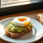 A slice of simple avocado toast with egg, topped with mashed avocado and a poached egg, surrounded by sunny-side-up, soft-boiled, and scrambled eggs.